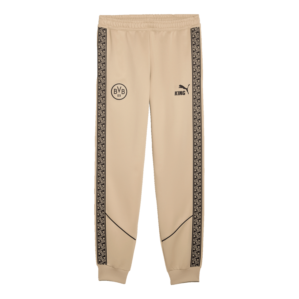 Pantalon de loisirs BVB beige avec des détails noirs, le logo BVB, l'inscription « KING » et des bandes latérales à motifs, idéal pour les supporters du Borussia Dortmund et les activités sportives de loisirs.