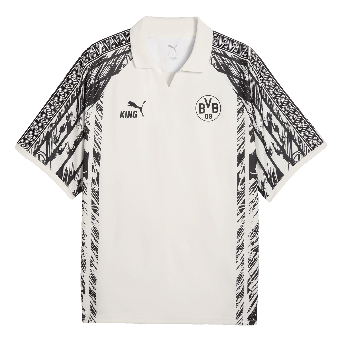 Maglia bianca del BVB "King" con dettagli neri e motivi grafici, stemma del BVB, logo PUMA e scritta "KING" sul petto.