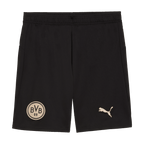 Black BVB jersey pants with a gold BVB emblem and PUMA logo, designed for the "100 Years of Rote Erde" collection.