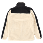 Vue de dos d'une veste polaire en peluche BVB au design « color block ». La veste associe des éléments de couleur crème et noirs pour un look doux et élégant.