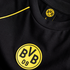 Close-up of a black-and-yellow BVB T-shirt featuring the BVB 09 logo, perfect for Borussia Dortmund fans.