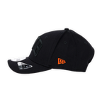 Cappellino nero del BVB della collezione New Era 9SEVENTY Heat II, con logo New Era sul lato e design moderno.