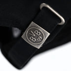 Schwarze Borussia Dortmund Kappe mit verstellbarer Metallschließe und eingeprägtem BVB 09 Logo für Fans.