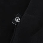 Schwarzer Kinder-Hoodie mit leuchtendem BVB 09-Logo und Borussia Dortmund-Schriftzug, ideal als Fanartikel.