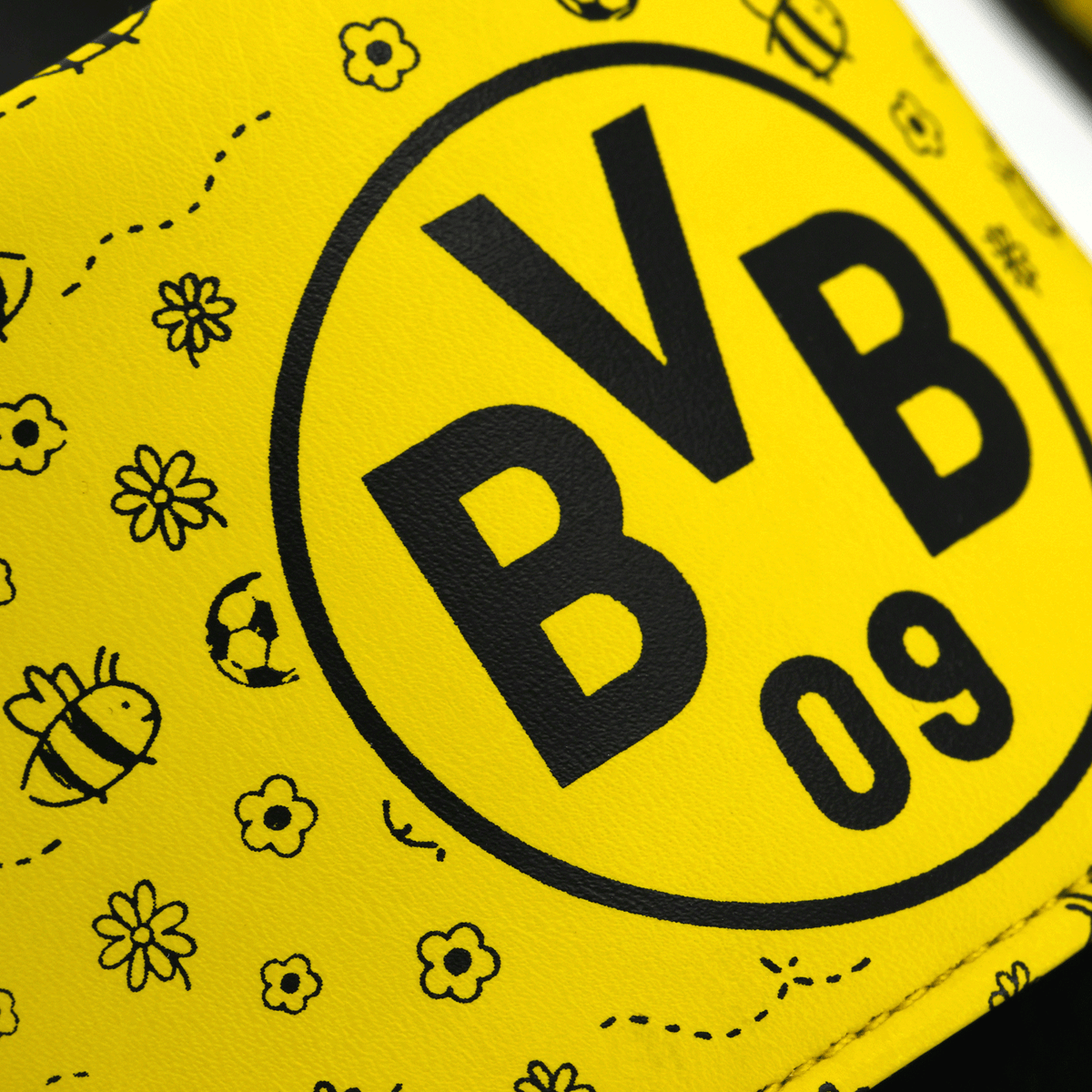 Black-and-yellow BVB flip-flops for kids featuring a large BVB logo and a cheerful bee pattern—perfect fan merchandise for the summer.