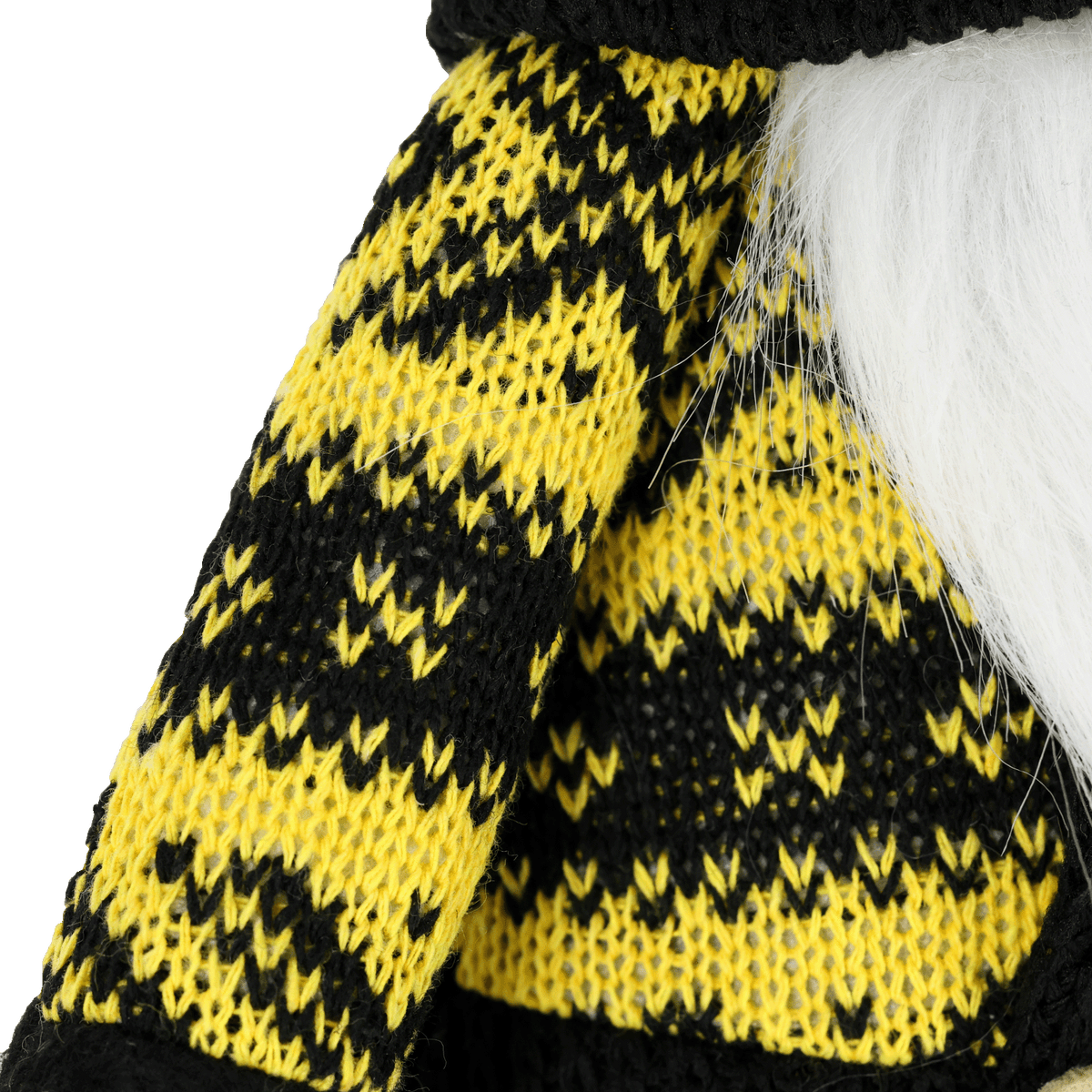 Detailansicht eines BVB-Wichtels mit schwarzgelben gestricktem Muster und weißen Haaren.