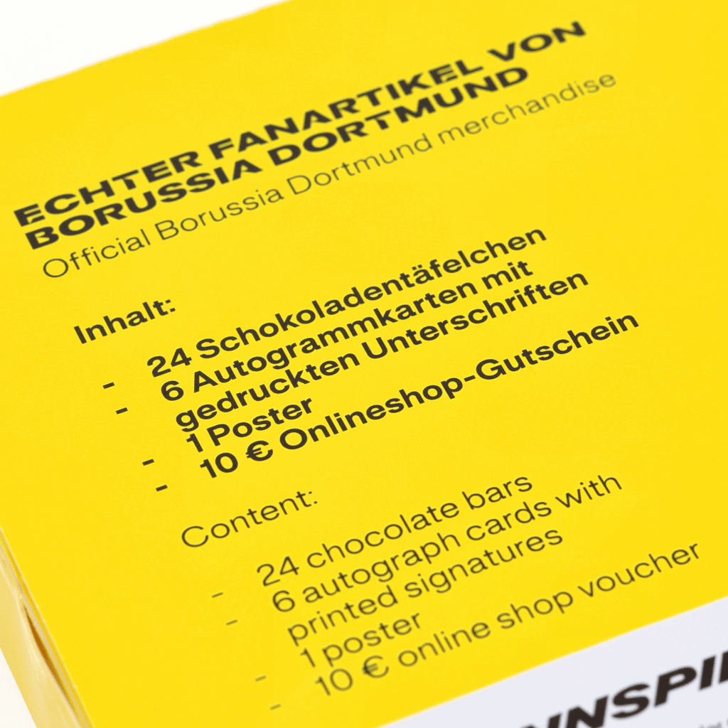 Comic-Adventskalender von Borussia Dortmund in schwarzgelbem Design; enthält Fanartikel wie Schokoladen, Autogrammkarten, ein Poster und einen Online-Gutschein.