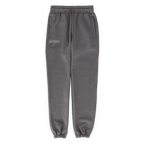 Graue BVB Urban Sweatpants mit elastischem Bund, Gummizug an den Beinenden, praktischen Taschen und dezentem Borussia Dortmund Logo. Perfekt für Freizeit und Sport.