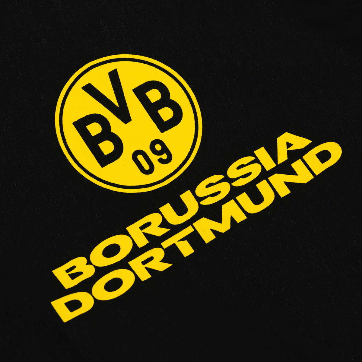 BVB-Schürze für Küche und Grill in den Vereinsfarben schwarzgelb mit großem BVB-Logo und Borussia Dortmund-Schriftzug als Fanartikel.