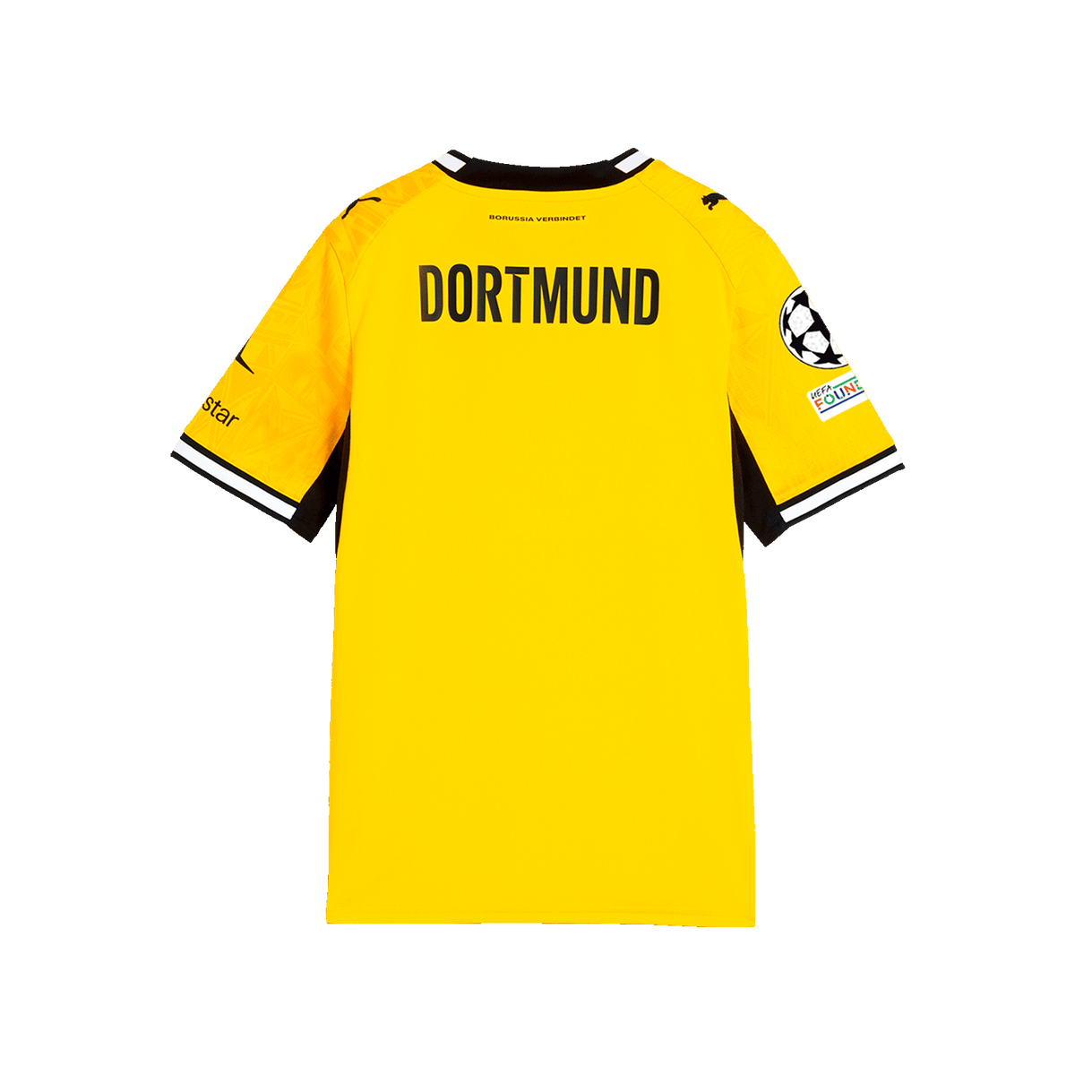 La imagen muestra la vista trasera de la camiseta amarilla de local del BVB para la temporada 26-27 para niños, con la inscripción «DORTMUND», el logotipo de PUMA y el logotipo de la Liga de Campeones en la manga.