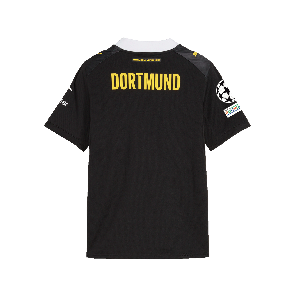 The BVB 26-27 away jersey for kids in black and yellow, back view featuring yellow “Dortmund” lettering and a Champions League badge on the sleeve.
