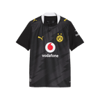 La camiseta de visitante del BVB para niños de la temporada 2026/2027, en colores negro y amarillo, con el escudo del BVB, el logotipo del patrocinador Vodafone y el logotipo de PUMA en la parte delantera.