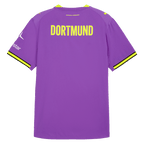 The purple BVB Authentic 26/27 away jersey, viewed from the back, featuring yellow "DORTMUND" lettering, black-and-yellow details, the PUMA logo on the shoulder, and the Polestar sponsor logo.