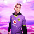 The 2026–27 purple BVB away jersey with yellow accents, the BVB crest, the PUMA logo, and the Vodafone and Polestar logos, set against a violet sky.