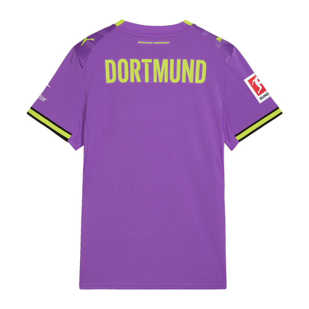 The image shows the purple BVB women's alternate jersey for the 2026–2027 season from the back, featuring yellow "DORTMUND" lettering and visible sponsor logos.