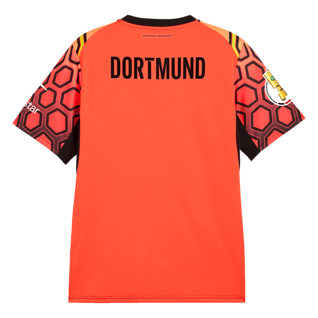 Red BVB goalkeeper jersey from the 26-27 season with "DORTMUND" lettering on the back, a black trim around the collar, and a geometric sleeve pattern in red and black.