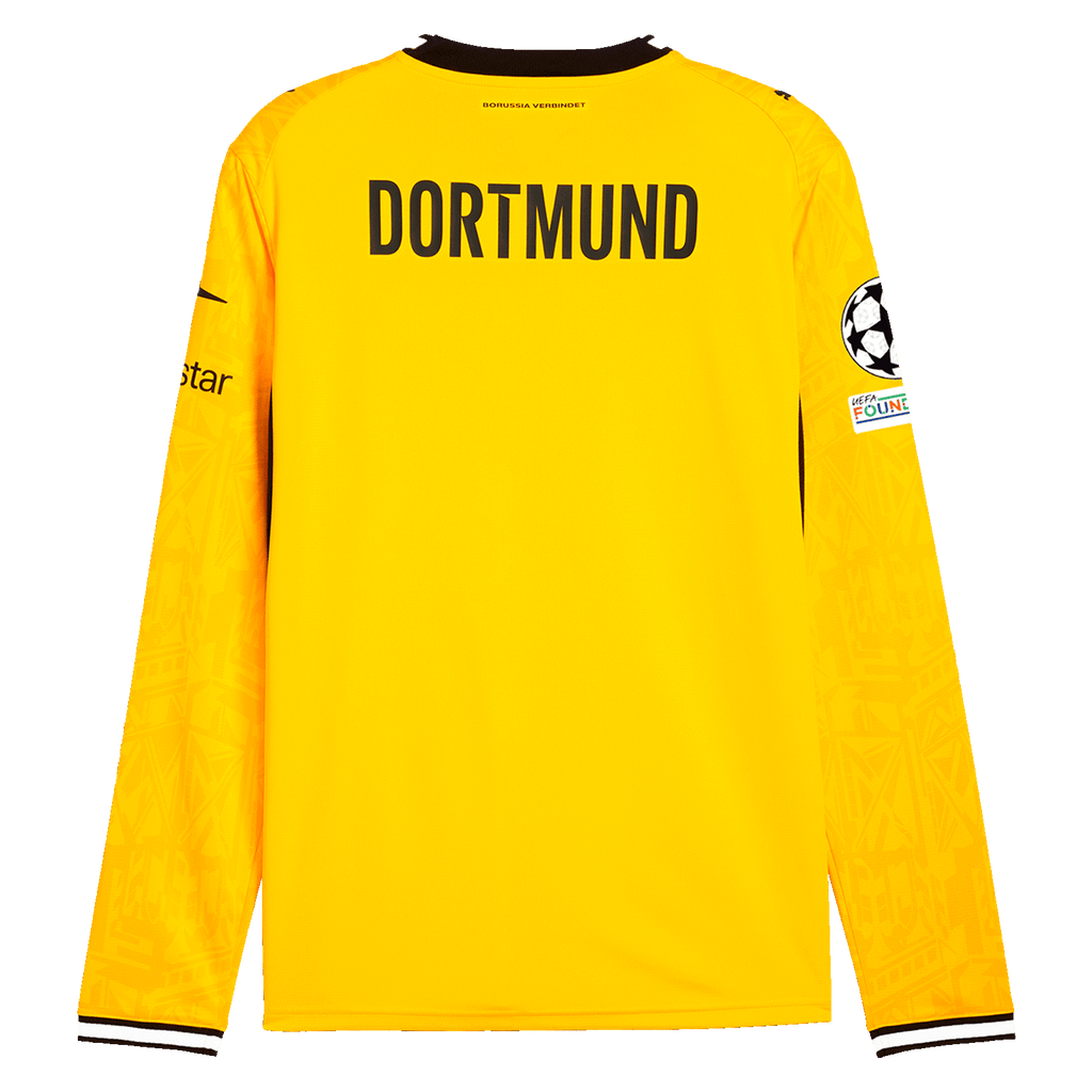 Maillot domicile jaune du BVB 26-27 à manches longues, vu de dos, avec l'inscription « DORTMUND » dans le dos, le logo Polestar, l'écusson de la Fondation de l'UEFA et le logo PUMA.