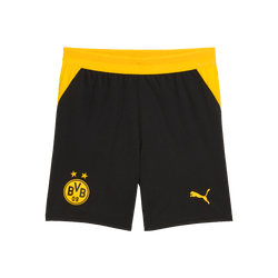 Schwarze BVB-Trikothose für Kinder, verziert mit gelben Akzenten, BVB-Logo und PUMA-Logo, ideal für junge Fußballfans.