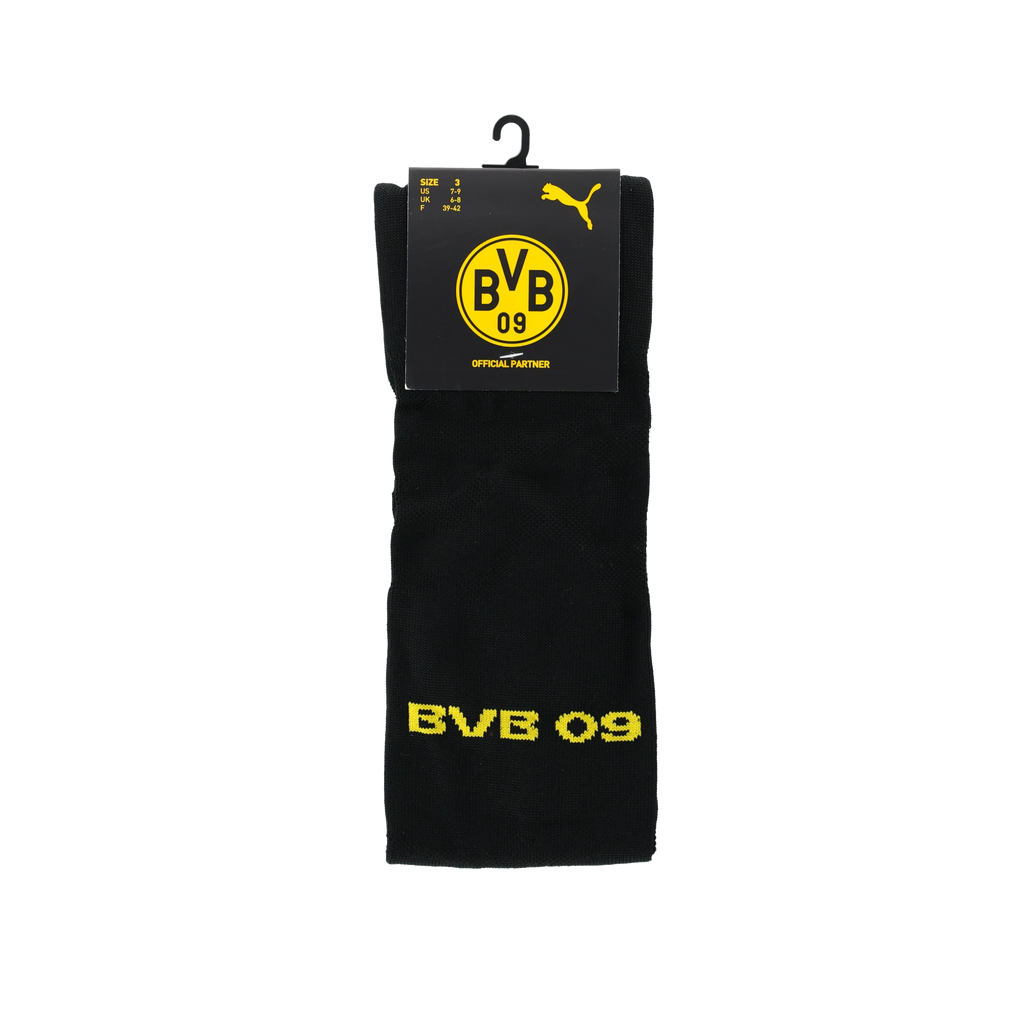 Schwarze BVB-Stutzen mit gelbem BVB 09-Schriftzug, in Originalverpackung mit Puma-Logo und BVB-Design.