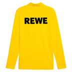 Maglia da allenamento gialla a maniche lunghe del BVB della stagione 26/27 con un grande logo REWE nero sul retro.