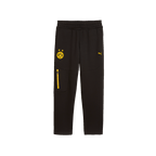 Pantalon de loisirs noir pour enfants issu de la collection BVB-Puma, orné du logo BVB jaune, du chat PUMA et d'une poche latérale zippée jaune.