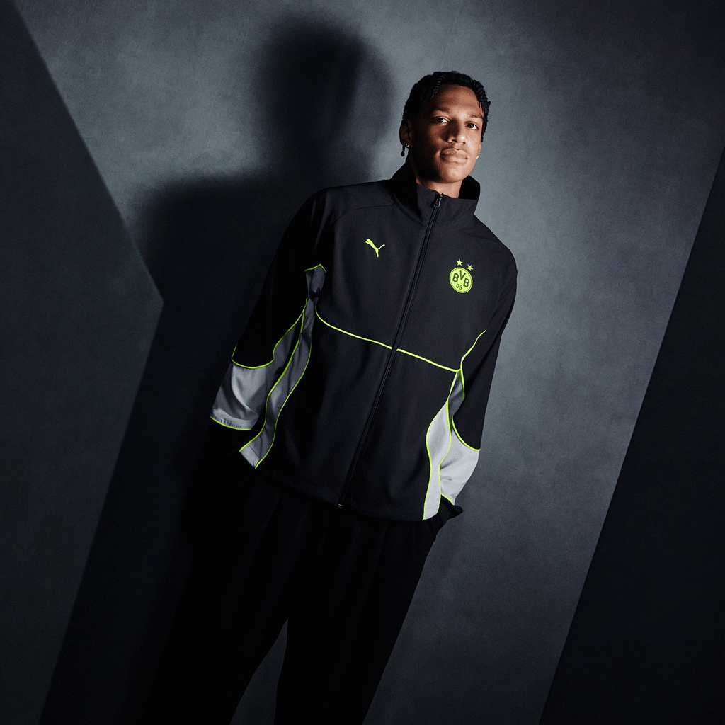 这款黑色BVB Puma Tech-X运动夹克点缀亮黄色细节，饰有BVB和PUMA标志，专为26-27系列设计。