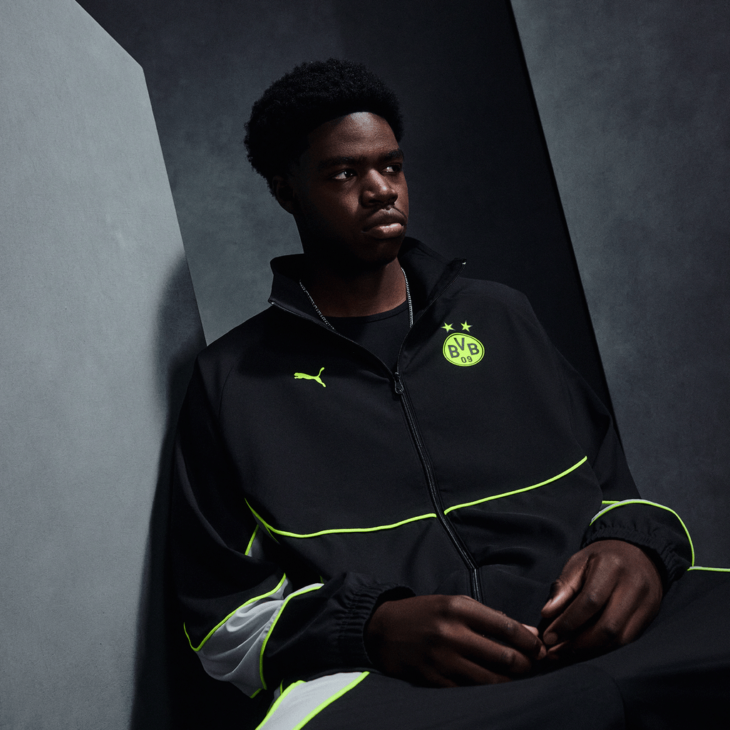 Giacca da allenamento Puma Tech-X del BVB 2026/2027, nera con dettagli gialli, logo BVB e logo PUMA, ideale per i tifosi e per le attività sportive.