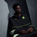 2026/2027款黑色多特蒙德（BVB）Puma Tech-X运动夹克，配有黄色点缀，印有BVB标志和PUMA标志，非常适合球迷和运动活动。