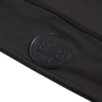 Schwarze BVB-Puma-Mütze mit prägnantem BVB 09-Logo, detailreiche Darstellung des Designs.