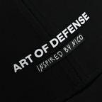 Cappellino nero del BVB con la scritta bianca ben visibile “Art of Defense” e l’aggiunta “Inspired by Nico” ad essa correlata.
