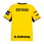 Vista trasera de la camiseta de local de la colección de balonmano 26-27 del Borussia Dortmund, en color amarillo con cuello negro y la inscripción «DORTMUND».