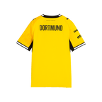 Vista posteriore della maglia gialla da casa del BVB della stagione 2026/27 per bambini, con la scritta “DORTMUND” in nero e dettagli neri.