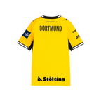 Le maillot domicile jaune du BVB 2026/2027 pour enfants, vu de dos, avec des détails noirs, l'inscription « DORTMUND » et l'écusson de la Ligue des champions.