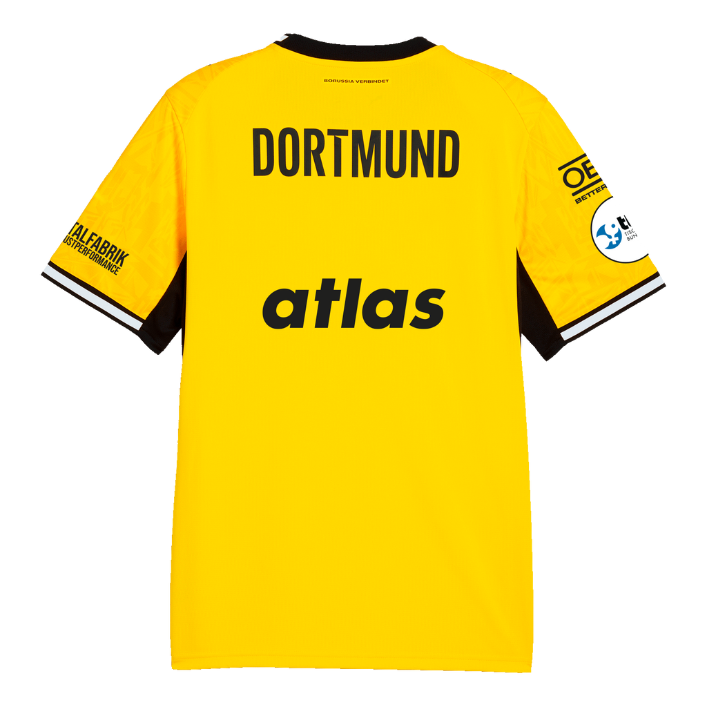 La camiseta local del BVB de la temporada 26-27, en negro y amarillo, vista desde atrás, lleva la inscripción «DORTMUND», mangas negras y los logotipos de los patrocinadores. Pertenece a la línea de ropa deportiva de PUMA y es un artículo muy popular entre los aficionados.