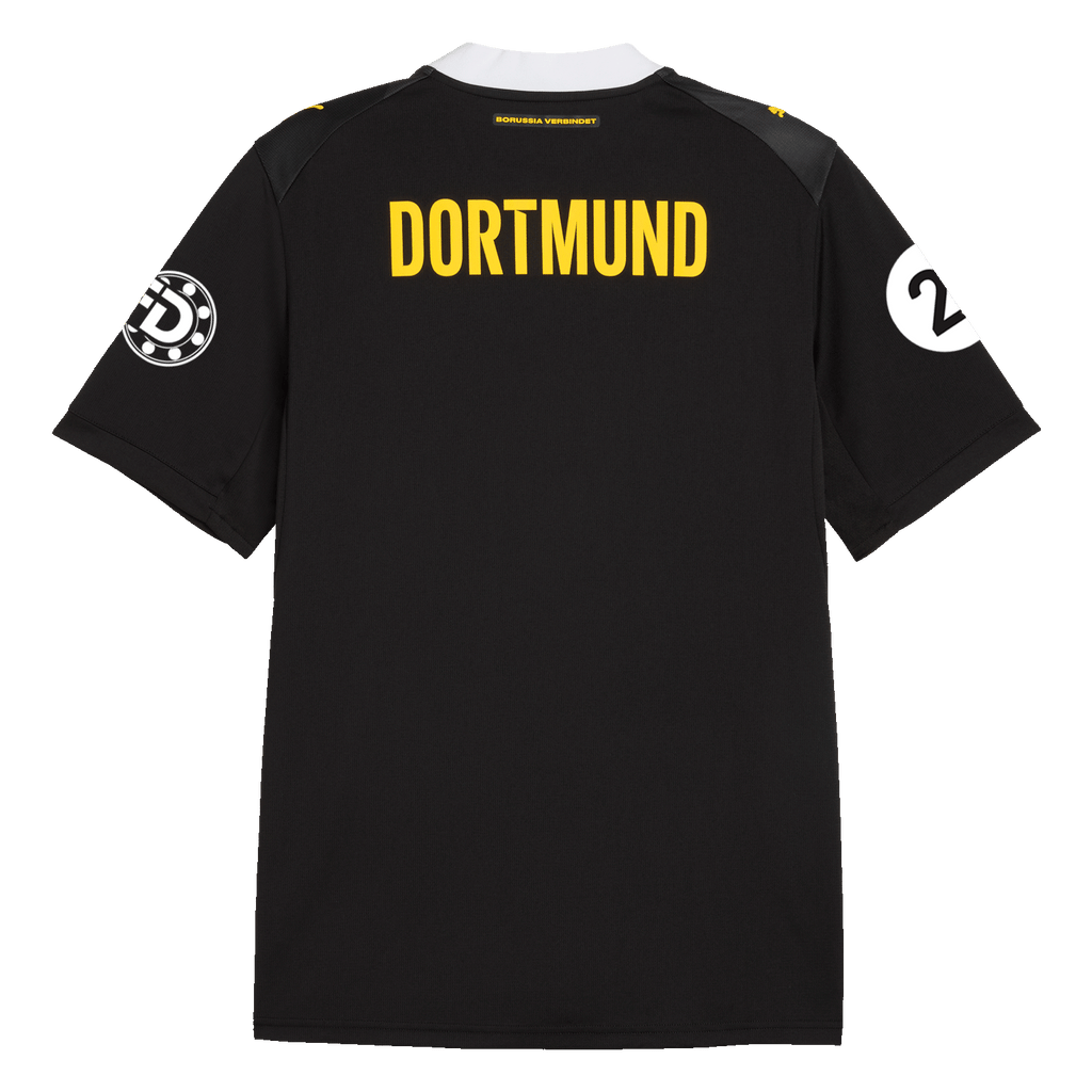 Vista posteriore della maglia da trasferta nero-gialla del BVB per la stagione 26-27 dedicata al calcio femminile, con la scritta “DORTMUND” sulla schiena e i caratteristici dettagli della squadra.