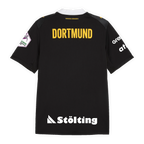 Rear view of the black-and-yellow BVB away jersey for the 2026–2027 handball season, featuring yellow "DORTMUND" lettering, white sponsor logos, and a black background.