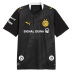 Maglia da trasferta nera del BVB per la stagione di pallamano 2026/27 con stemma giallo del BVB, logo Puma e logo SIGNAL IDUNA sul davanti.