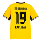 2026/27シーズンのBVBの黄色いホームユニフォームの背面。背番号19（黒）と「Karetsas」のロゴが入っています。