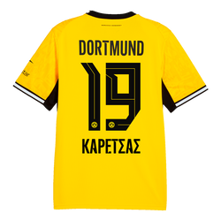 La maglia gialla da casa del BVB per la stagione 2026/27 vista da dietro, con il numero 19 nero e la scritta "Karetsas".