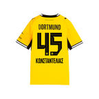 Vista posteriore della maglia da casa del BVB 2026/27 in nero e giallo per bambini, numero 45 con il nome Konstantelias, colletto nero, polsini neri.